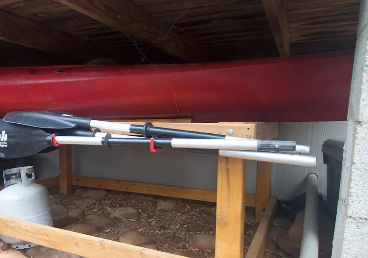 Timber posts and beam under a raised deck
